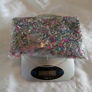 Nearly a pound of mixed 2mm-3mm beads, almost a pound of seed beads in all color